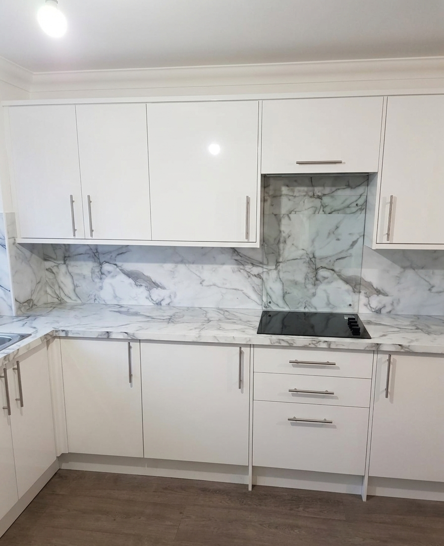 Close-up detail of the same Edinburgh bespoke kitchen — cabinetry, worktop and fixtures.